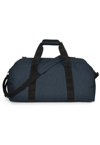 Eastpak Station + Duffelbag -  Triple Denim, fotad mot en vit bakgrund.