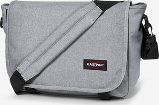 Eastpak JR Axelremsväska - Sunday Grey, fotad mot en vit bakgrund.