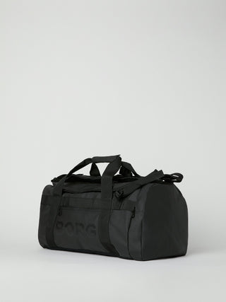 Björn Borg Duffle Bag 35L - Black Beauty, fotad mot en ljusgrå bakgrund