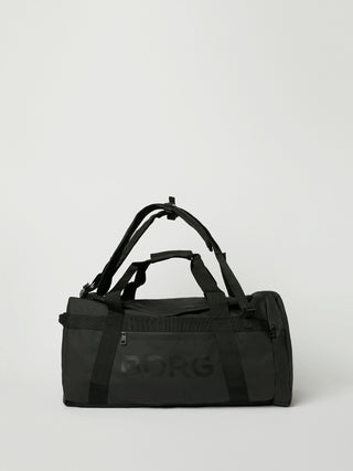 Björn Borg Duffle Bag 55L - Black Beauty, fotad mot en ljusgrå bakgrund