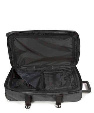 Eastpak Tranverz Mellanstor Resväska - Black Denim, fotad mot en vit bakgrund.