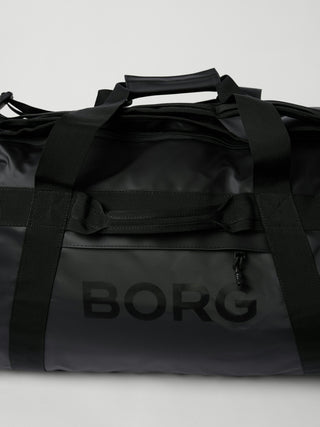 Björn Borg Travel Duffle Bag 120L - Black Beauty, fotad mot en ljusgrå bakgrund