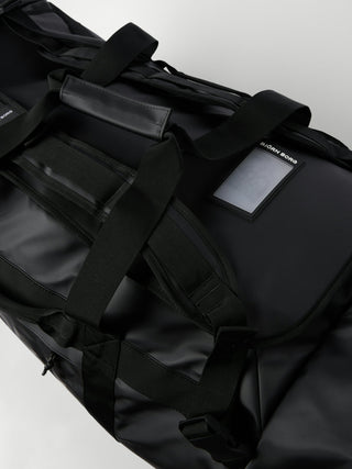 Björn Borg Travel Duffle Bag 120L - Black Beauty, fotad mot en ljusgrå bakgrund