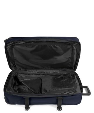 Eastpak Tranverz Stor Resväska - Triple Denim, fotad mot en vit bakgrund.