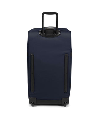 Eastpak Tranverz Stor Resväska - Triple Denim, fotad mot en vit bakgrund.