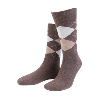 Amanda Christensen True Argyle Sock - Brown melange, fotad mot en vit bakgrund.