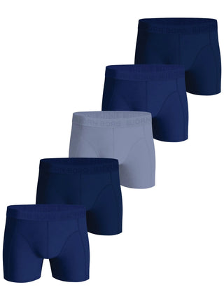 Visar 5-pack björn borg kalsonger framifrån i olika nyanser av blått. 