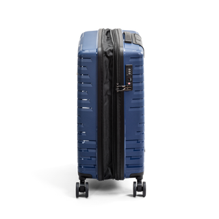 North Pioneer TOS Kabinväska 55 cm - Blå hårdskal med vågmönster – teleskophandtag i kopparfärg och 360° hjul för smidig manövrering och stilren design fotad mot en vit bakgrund 