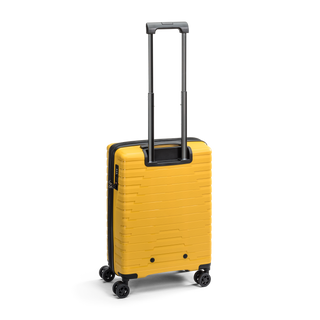 North Pioneer TOS Kabinväska 55 cm - Gul hårdskal med vågmönster – teleskophandtag i kopparfärg och 360° hjul för smidig manövrering och stilren design fotad mot en vit bakgrund 