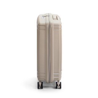 North Pioneer New York Kabinväska 55 cm - Beige hårdskal med vågmönster – teleskophandtag i kopparfärg och 360° hjul för smidig manövrering och stilren design fotad mot en vit bakgrund 