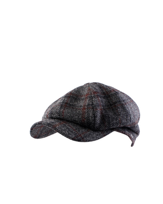 Wigéns Newsboy Classic Keps - Svartmelerad med Klassiskt Rutmönster fotad mot en vit/grå bakgrund. 