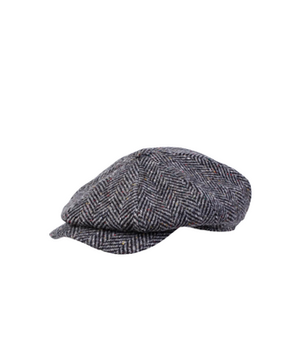 Wigéns Newsboy Retro Keps – Grå Donegal med Fiskbensmönster härlig retro herrkeps från wigéns fotad mot en vit bakgrund