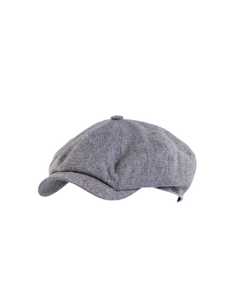 Wigéns Newsboy Retro Keps – Ljusgråmelerad med Fiskbensmönster härlig retro herrkeps från wigéns fotad mot en vit bakgrund