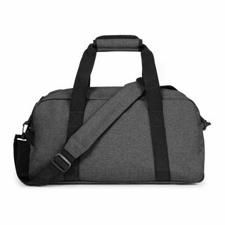 Eastpak Compact+ Duffelbag - Black Denim, fotad mot en vit bakgrund.