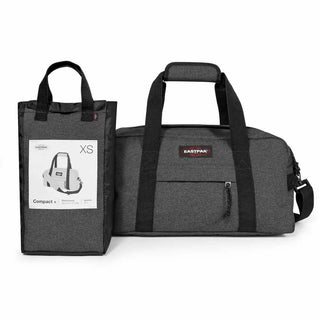 Eastpak Compact+ Duffelbag - Black Denim, fotad mot en vit bakgrund.