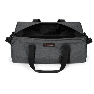 Eastpak Stand+ Duffelbag 34L - Black Denim, fotad mot en vit bakgrund.