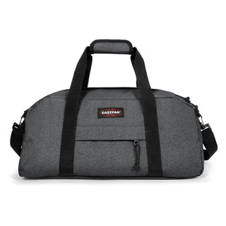 Eastpak Stand+ Duffelbag 34L - Black Denim, fotad mot en vit bakgrund.