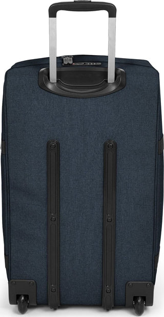 Eastpak Transit'R Stor Resväska - Triple Denim, fotad mot en vit bakgrund.