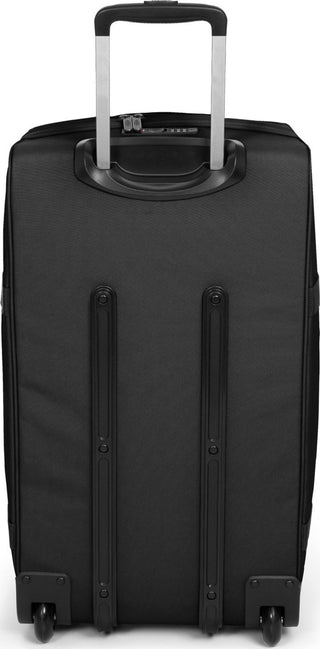 Eastpak Transit'R Mellanstor Resväska - Black, fotad mot en vit bakgrund.