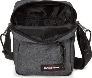 Eastpak The One Crossbodyväska - Black Denim, fotad mot en vit bakgrund.