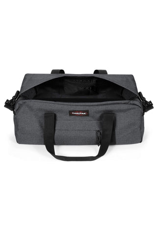 Eastpak Station + Duffelbag -  Black Denim, fotad mot en vit bakgrund.